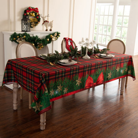 Mantel Joyfol Day con diseno de cuadros navideños, ideal para cenas festivas.