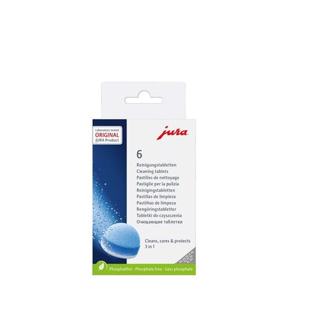 JURA tabletas se disuelven en agua para limpieza eficiente.