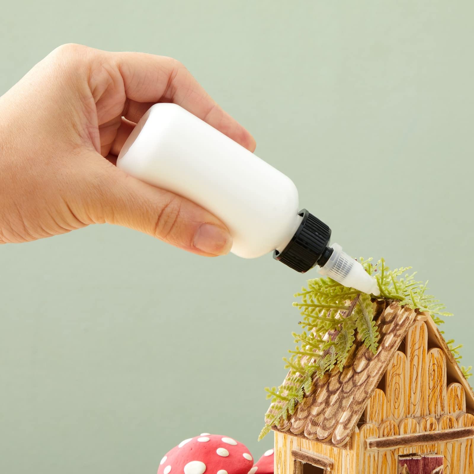 Botellas dispensadoras Juvale para aderezos y salsas con dosificación precisa.