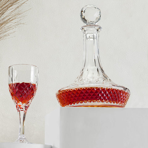 KANARS decantador con base pesada para estabilidad al servir vino.
