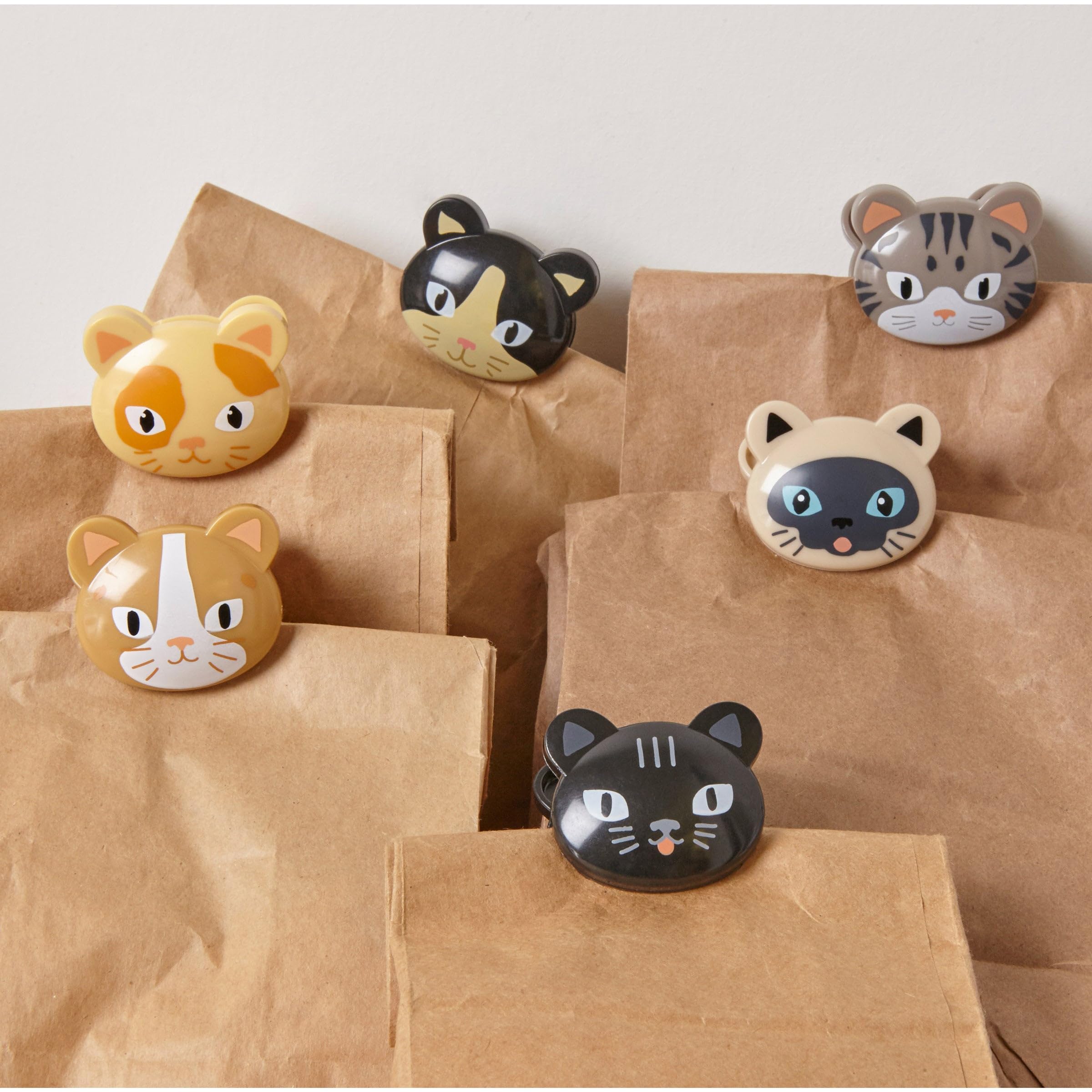 Clip de cierre firme de gato Kikkerland ideal para bolsas de meriendas y café.
