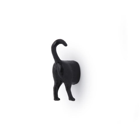 Imán decorativo de cola de gato de Kikkerland para la cocina.