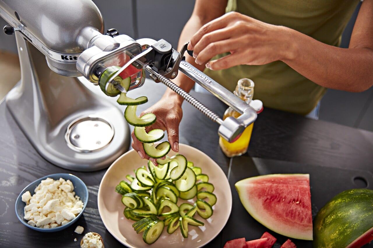 KitchenAid Spiralizer Plus peeling blade peeling an apple for snacks