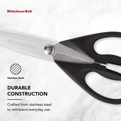 KitchenAid tijeras en uso en la cocina facilitando cortes rápidos