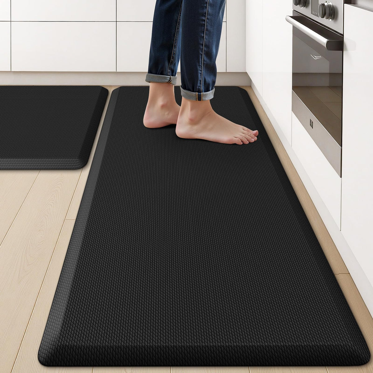 KitchenClouds alfombrilla-cocina-antifatiga negra para mayor comodidad al cocinar.