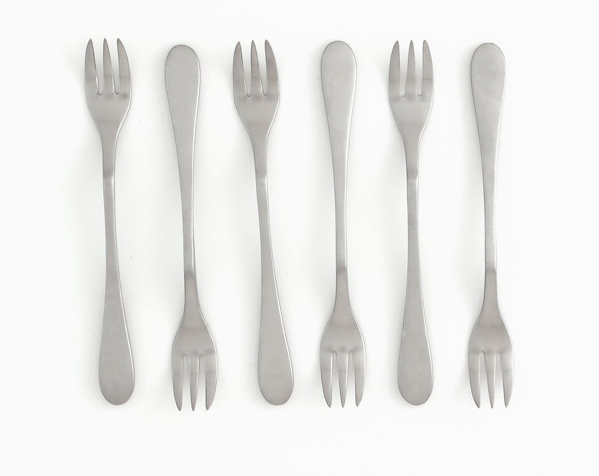 Diseño elegante KNORK y mango ergonómico para servir con estilo.