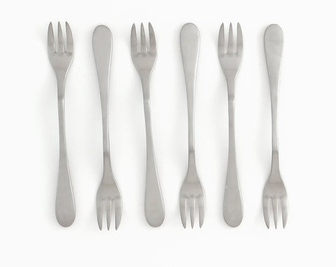Diseño elegante KNORK y mango ergonómico para servir con estilo.