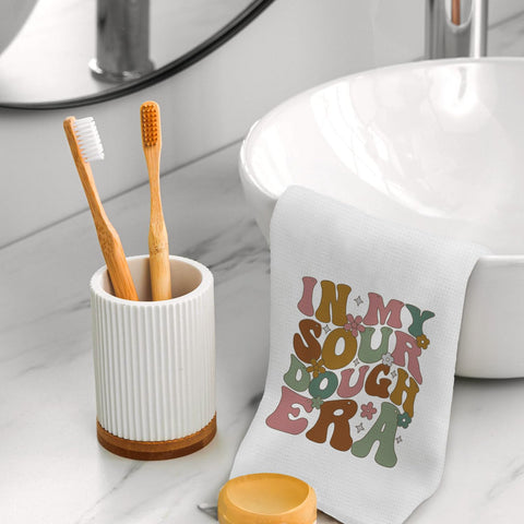 Koesus toallas masa madre, enfoque diseño temático, ideal para cocinas creativas.