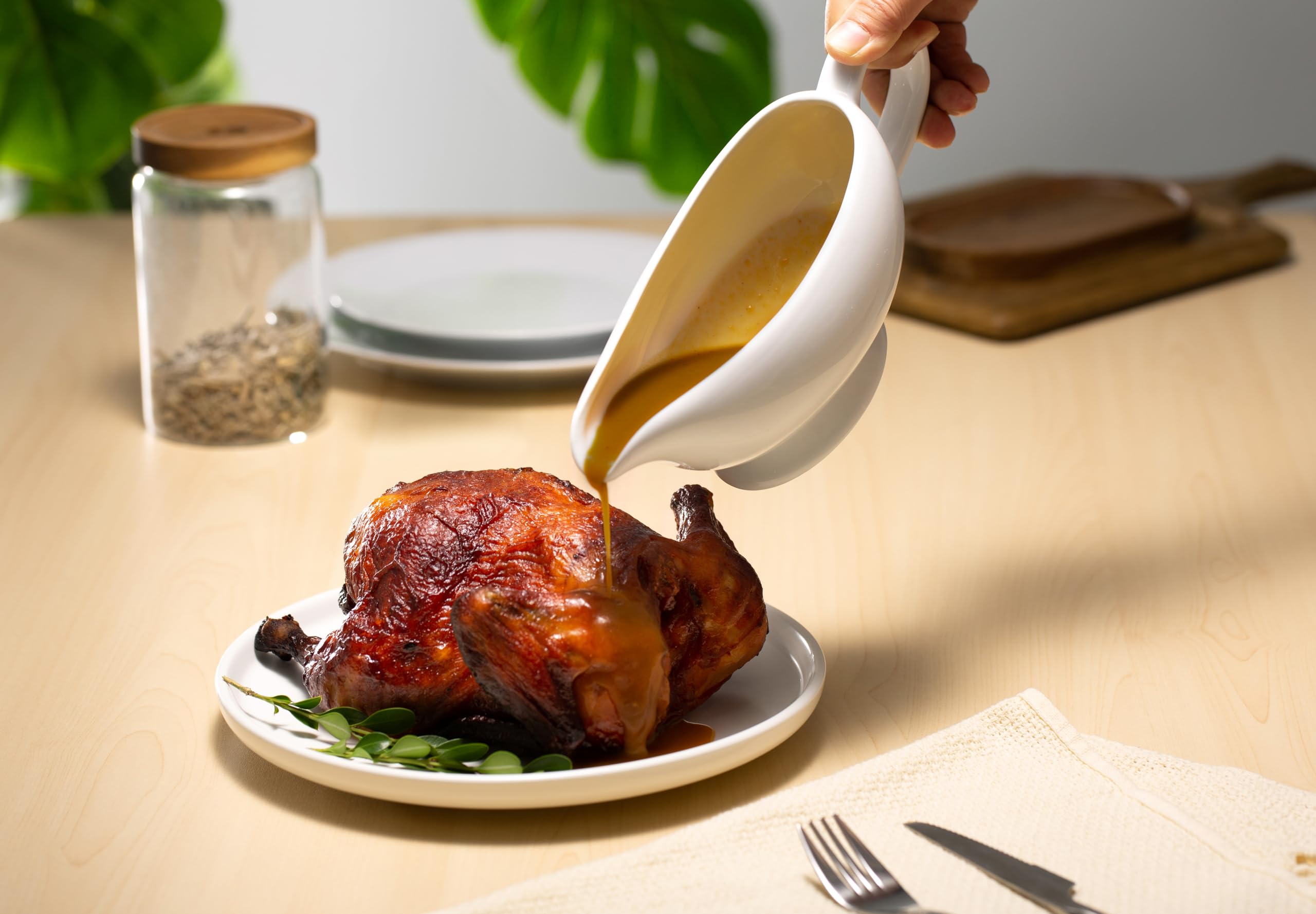 Dispensador de salsas KooK en porcelana, diseño elegante y sin salpicaduras.