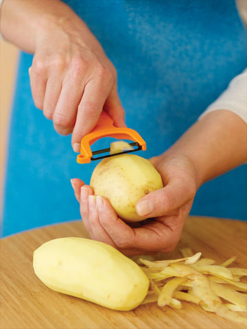 Kuhn Rikon Pelador Original Suizo: mango ergonómico para peeling cómodo a derecha o izquierda