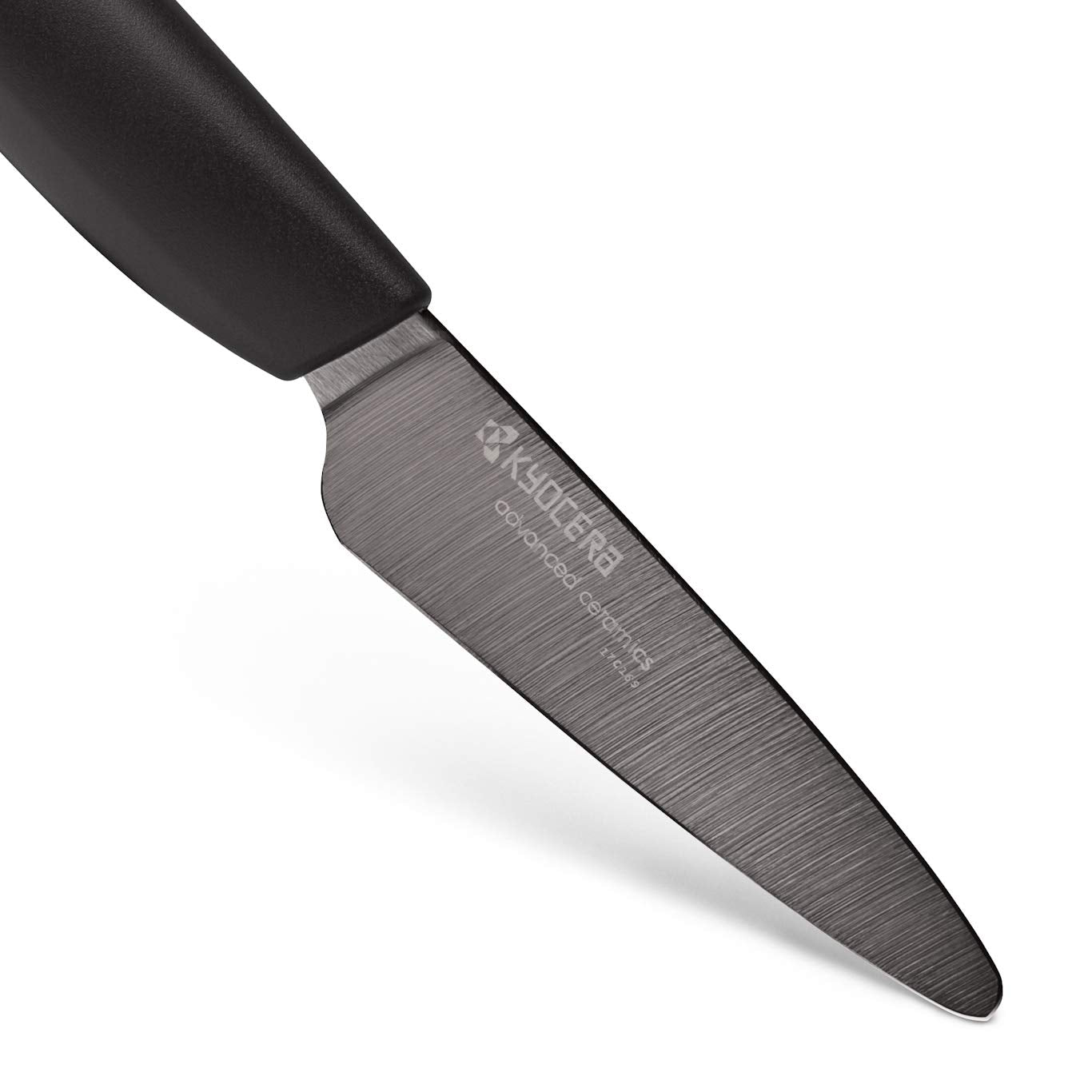 Kyocera cuchillo cerámico 3 pulgadas rebanando frutas y verduras con precisión.