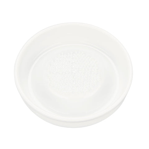 Rallador cerámico Kyocera enfocado en jengibre para sabor puro y textura fina.