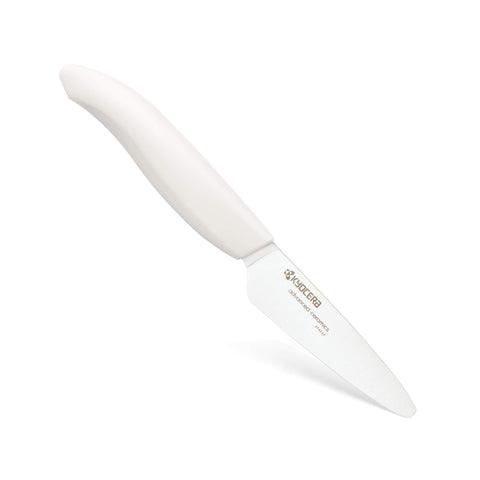 Cuchillo pelador Kyocera Revolution de 3 pulgadas con mango blanco para pelar frutas con precisión