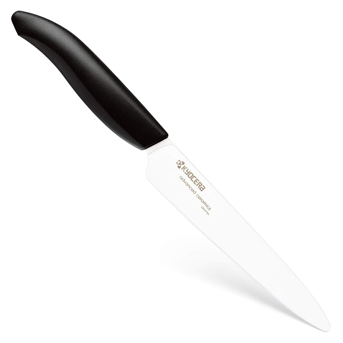Cuchillo Kyocera Revolution para cortar frutas y verduras con filo cerámico duradero.