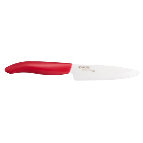 Cuchillo Kyocera Revolution con manija roja para cortes precisos en frutas y verduras