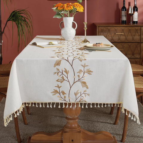 Mantel Laolitou 55x86 impermeable beige con flor para proteger la mesa