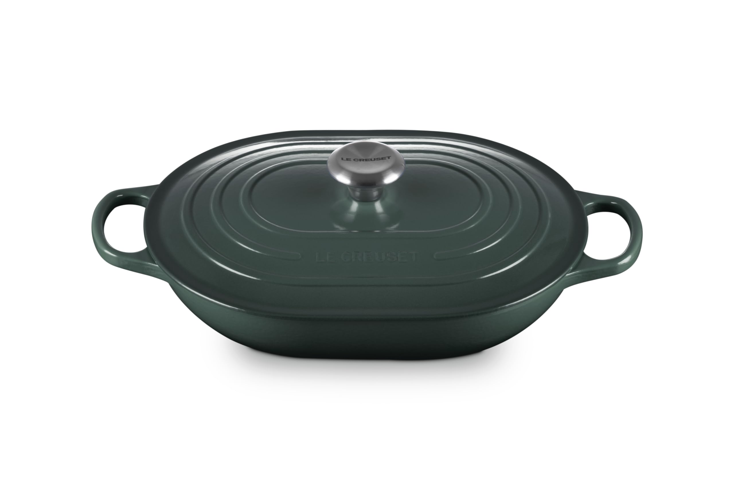 Le Creuset cazo oval esmaltado con tapa Artichaut, cocción uniforme y lista para mesa.