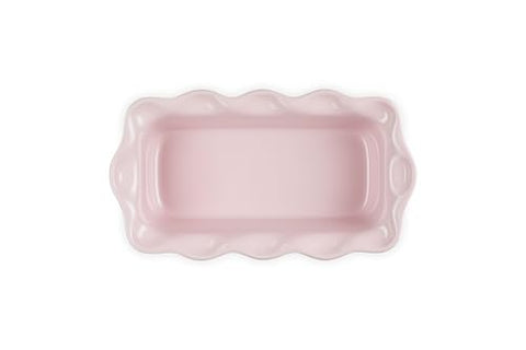 Le Creuset esmalte colorido antiadherente facilita limpieza rápida tras hornear.