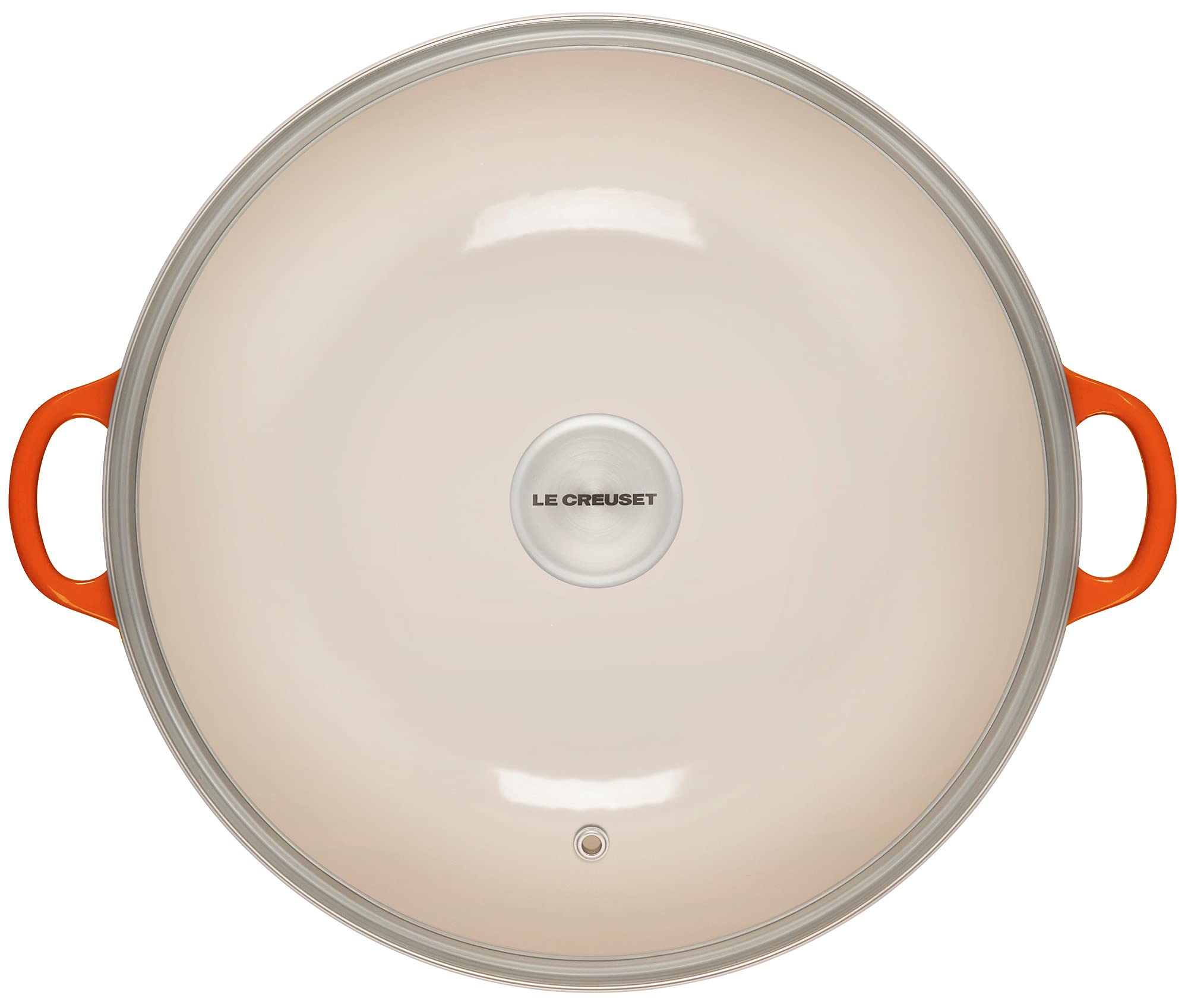 Le Creuset Horno Chef tapa de vidrio circula vapor para mantener humedad.