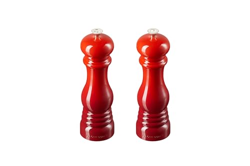 Molinillos cerámicos Le Creuset con mecanismo fino para una molienda uniforme de sal y pimienta.