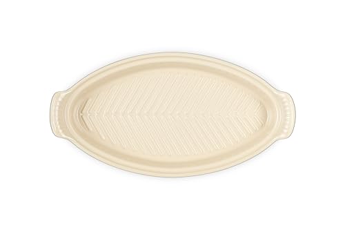 Le Creuset motivo pez en relieve, detalle elegante y fácil de limpiar.