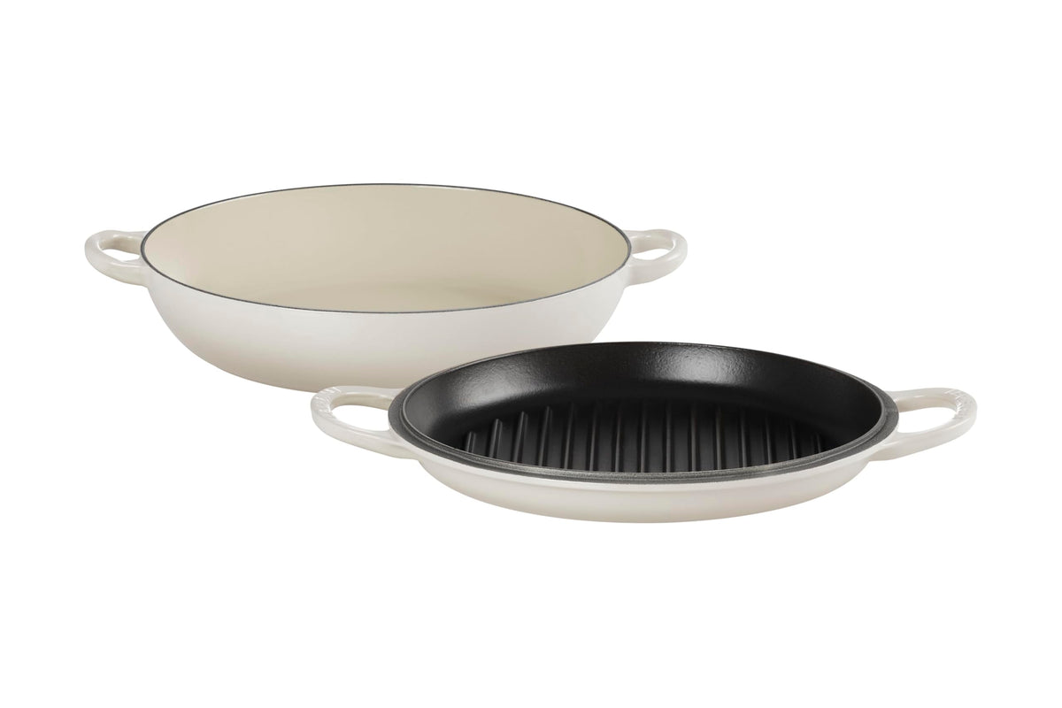 Le Creuset: olla de hierro esmaltado, distribución de calor uniforme para resultados consistentes.