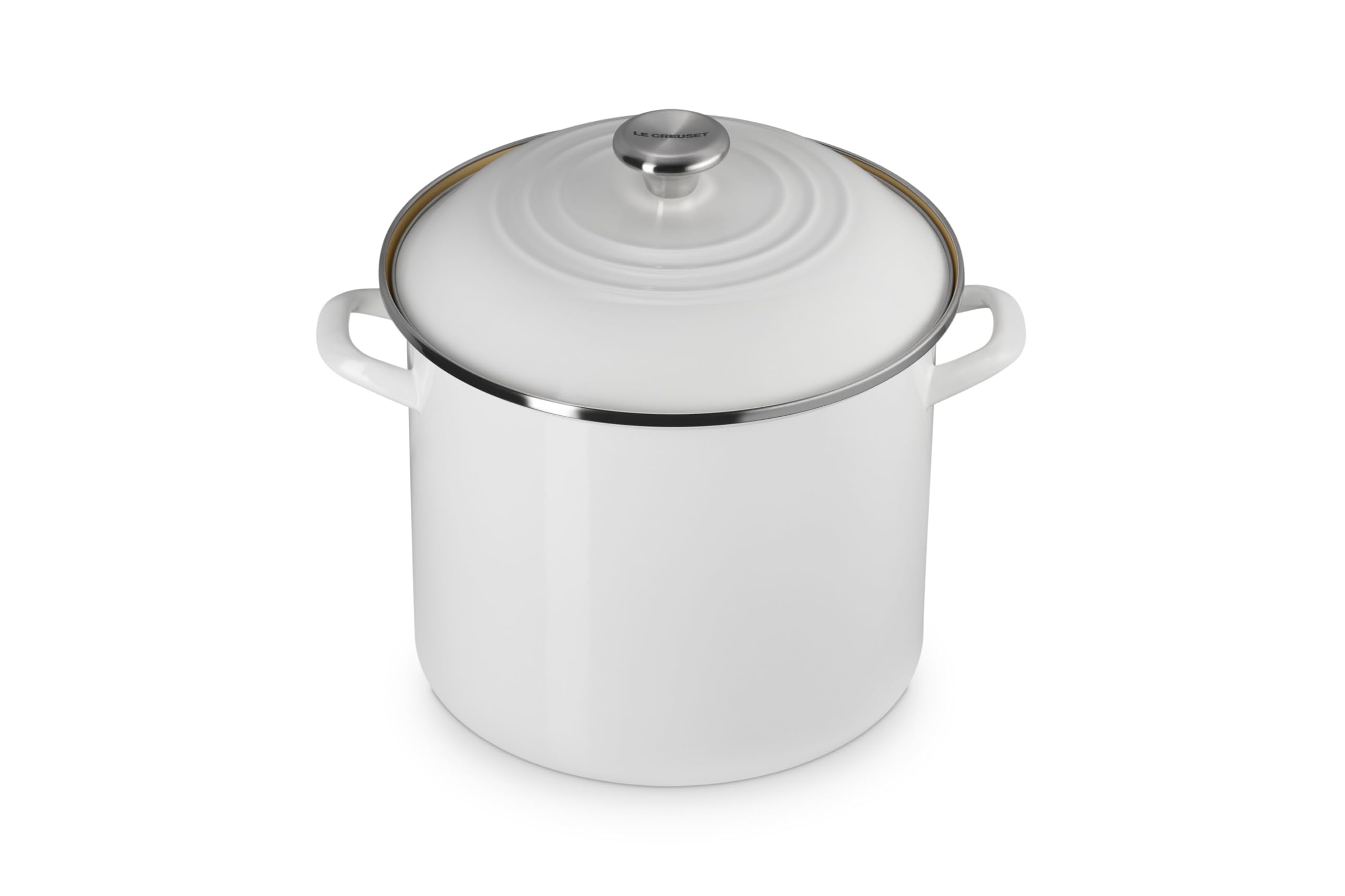 Olla Le Creuset esmaltada en acero blanco, calentamiento rápido y retención de calor.