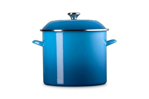 Pomo de acero inoxidable en tapa Le Creuset, manejo seguro y temperatura estable.
