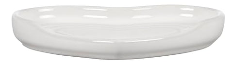Reposacucharas Corazón de Le Creuset, en mesa, diseño elegante.