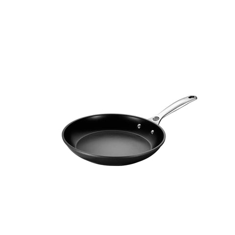 Le Creuset Sartén Pro con tapas de vidrio templado aptas para horno.