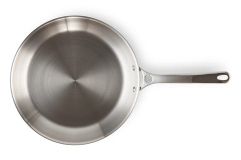 Le Creuset Sartén de triple capa 12 pulgadas, exterior de acero inoxidable con titanio para evitar manchas y decoloración