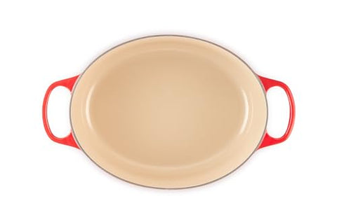 Tapa oval Le Creuset Cerise: domo que mantiene humedad para guisos jugosos.