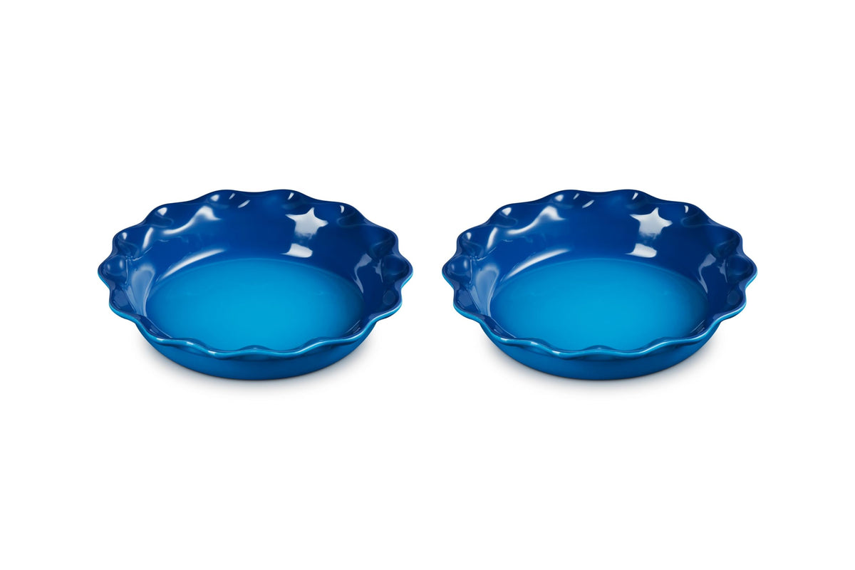 Le Creuset tarta Heritage ondulada, horneado uniforme y porciones limpias al servir.