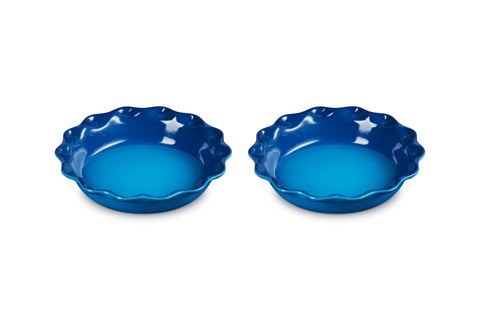 Le Creuset tarta Heritage ondulada, horneado uniforme y porciones limpias al servir.