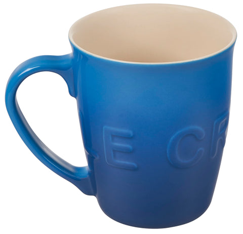 Le Creuset taza logo extralarga Marseille 20oz: agarre cómodo y diseño envolvente para café.