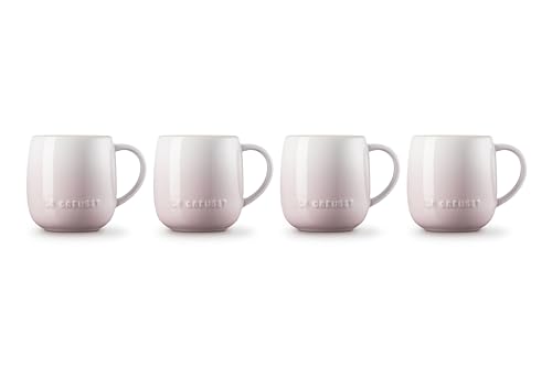 Tazas rosa concha apiladas Le Creuset, ahorro de espacio.