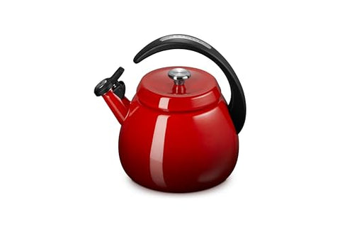 Le Creuset Tetera Cloche Cerise, mano sosteniendo, mango ergonómico seguro