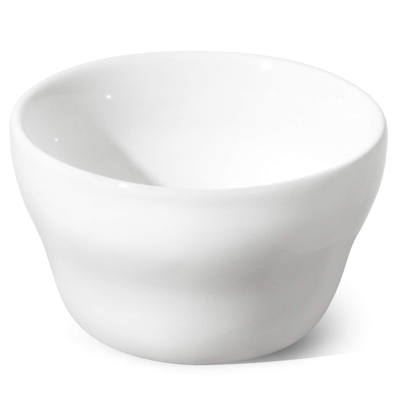 LE TAUCI diseño curvo, cuenco blanco que realza la presentación de la comida.
