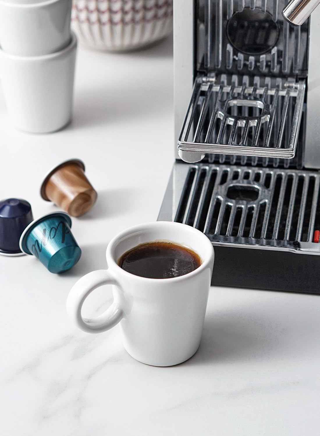 LE TAUCI taza con mango ergonómico para agarre cómodo durante la pausa de café.