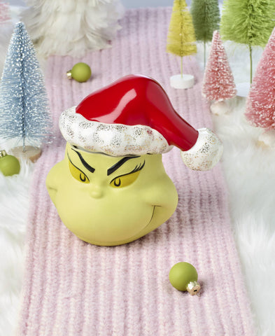 Lenox Grinchmas sombrero del Grinch añade toque festivo a la mesa.