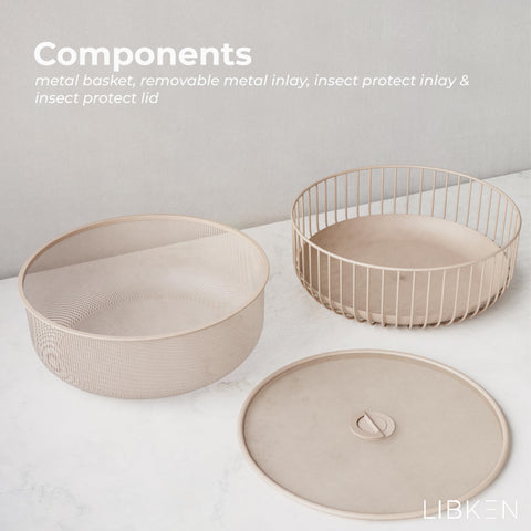 LIBKEN Frutero sobre encimera en tono durazno para cocina moderna.