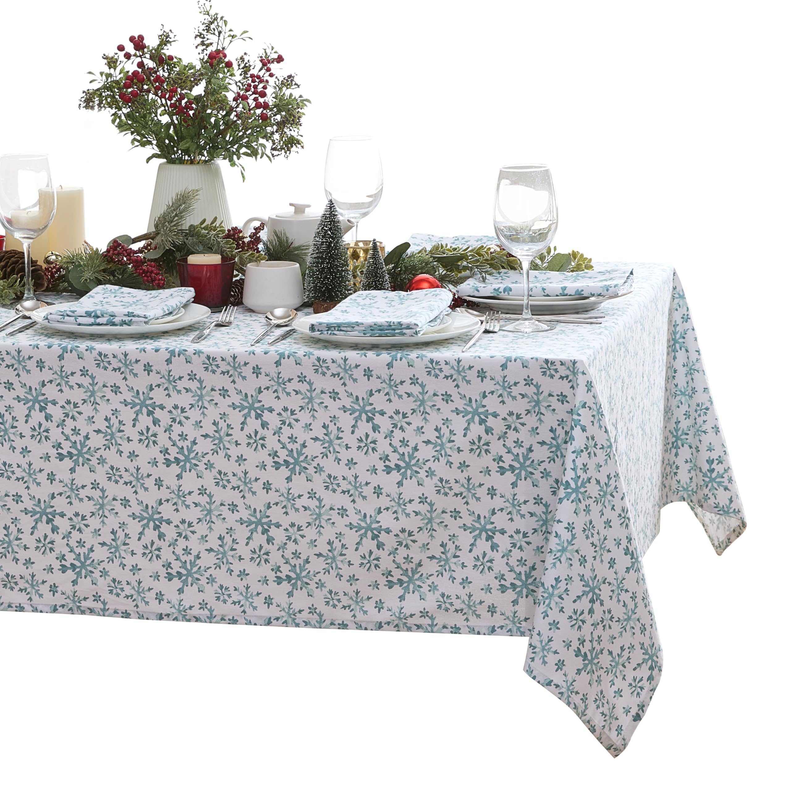 Mantel Lintex con copos de nieve azules sobre blanco, ideal para cenas festivas sin complicaciones