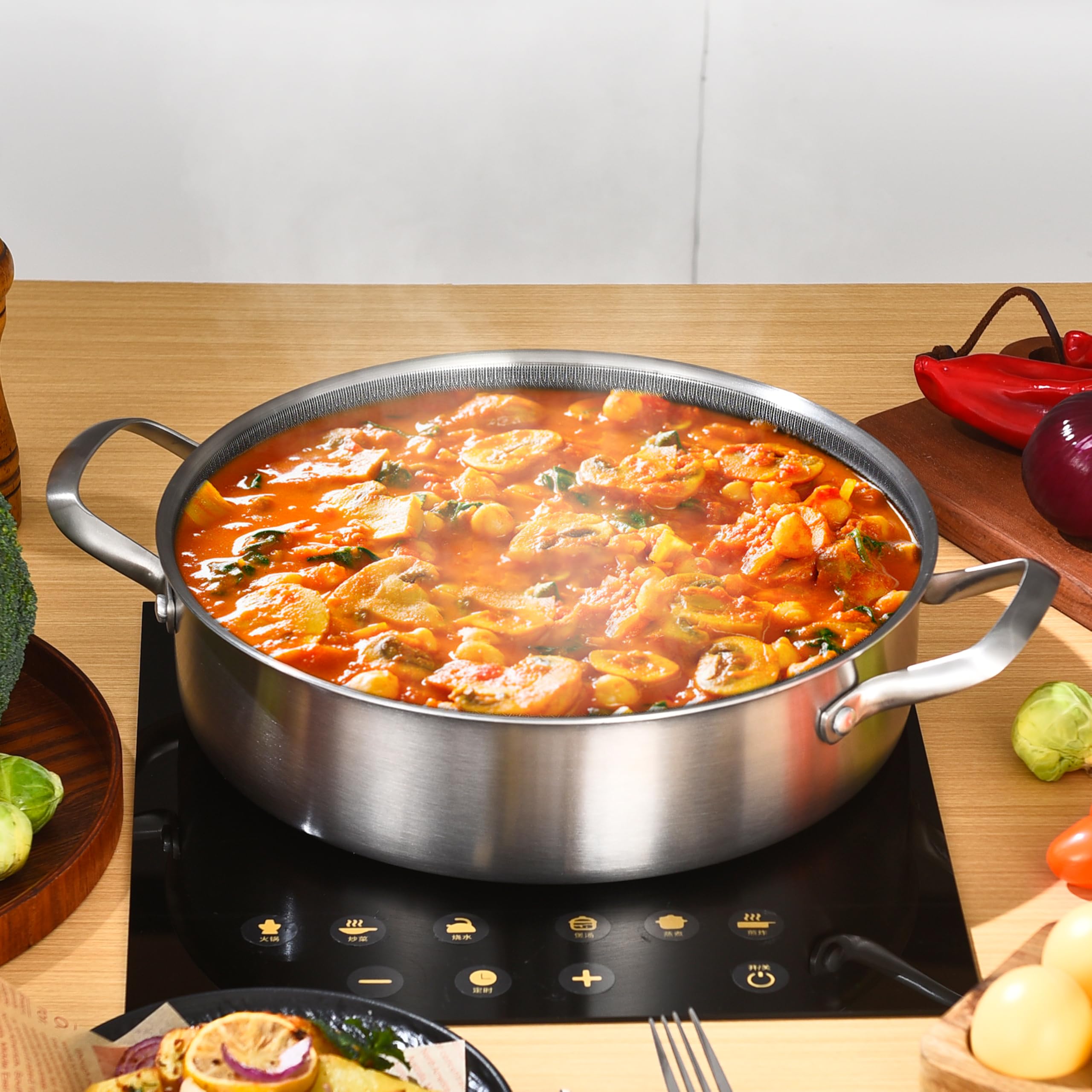 Tapa de vidrio compatible con la sartén para vigilar guisos sin perder calor.
