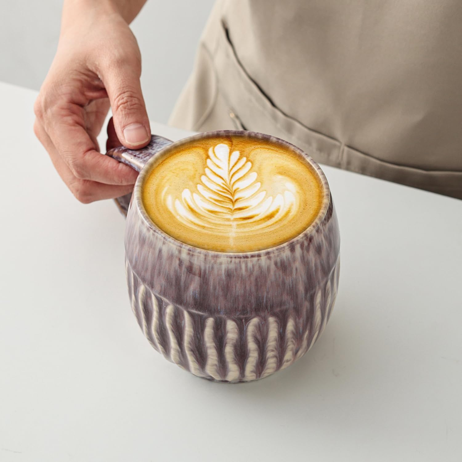 Base estable y asa ergonómica en lpylxingyan 600 ml morada.