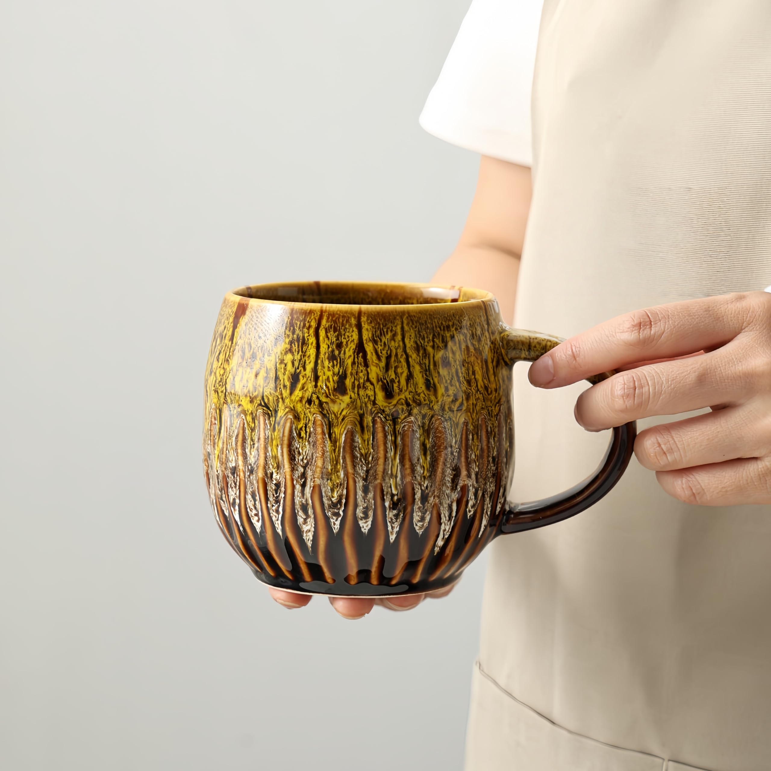 Taza lpylxingyan veinte onzas con diseño Raku único, ideal para un café matutino distintivo.
