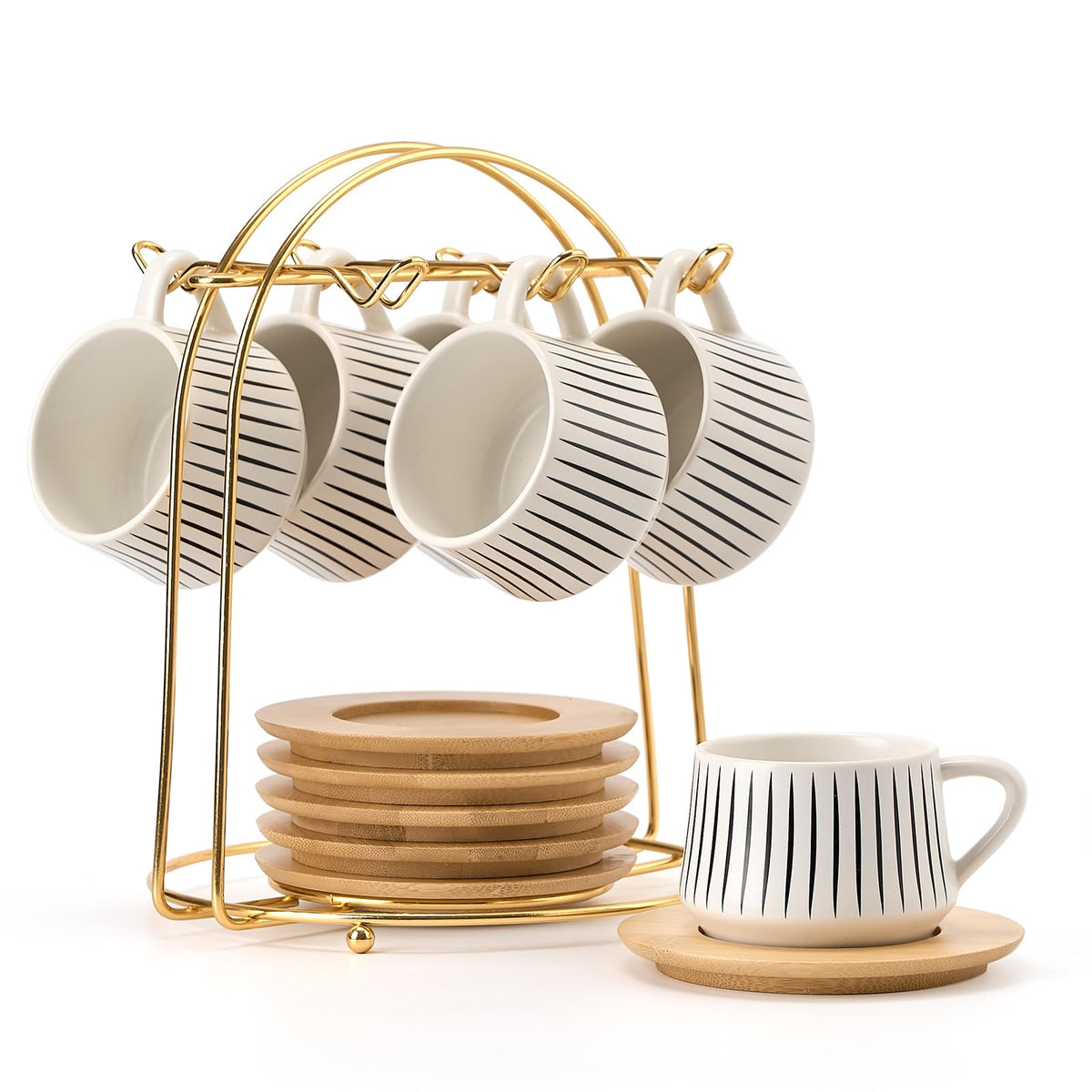 Tazas demitasse Luka en cerámica blanca con platillos y soporte metálico para un servicio elegante.