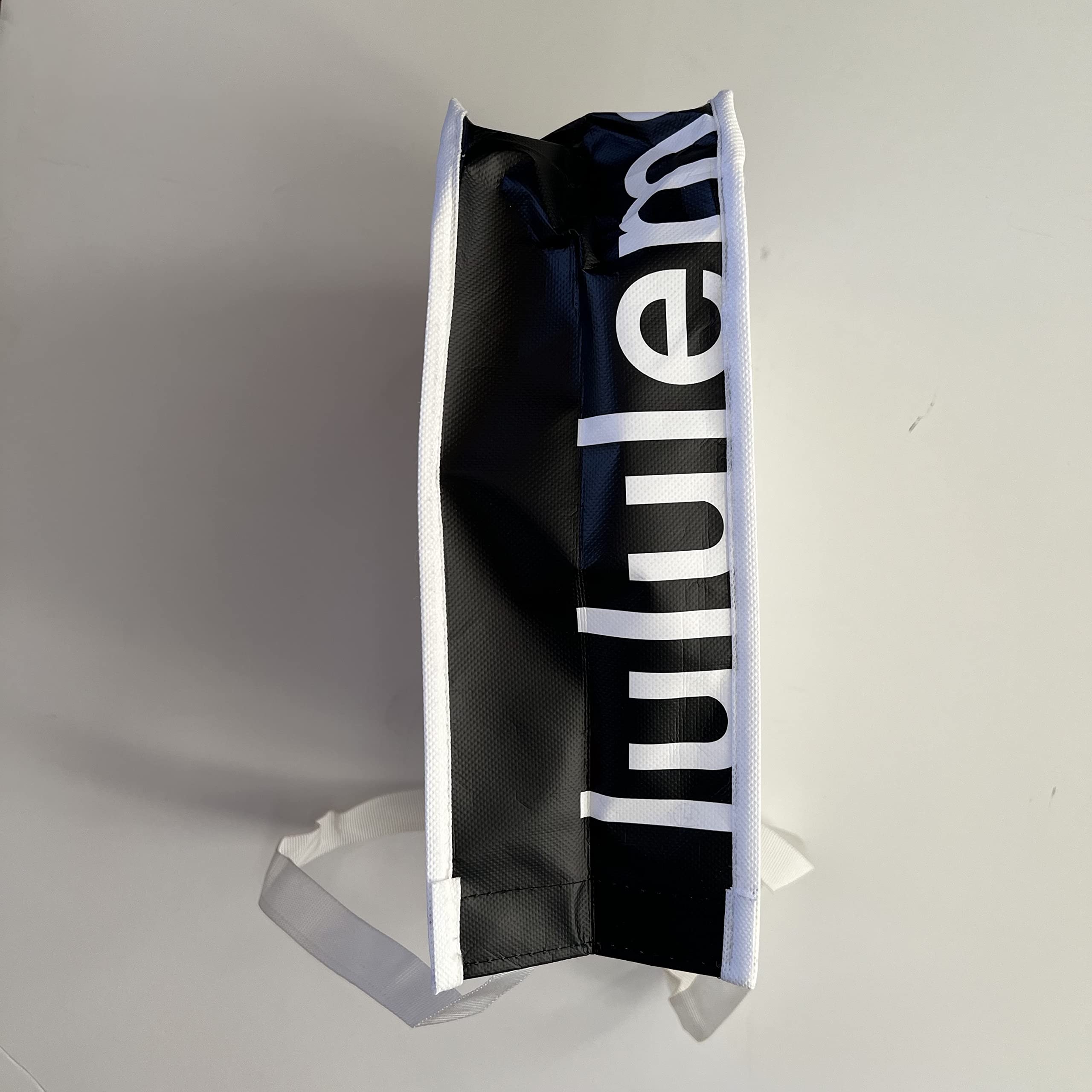 Bolsa tote blanca de lululemon para compras, ideal para organización y reutilizable.