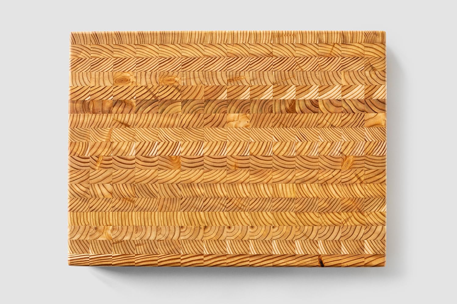 Tabla LW Handmade Larch grano final, vista de grosor para control de cuchillos.