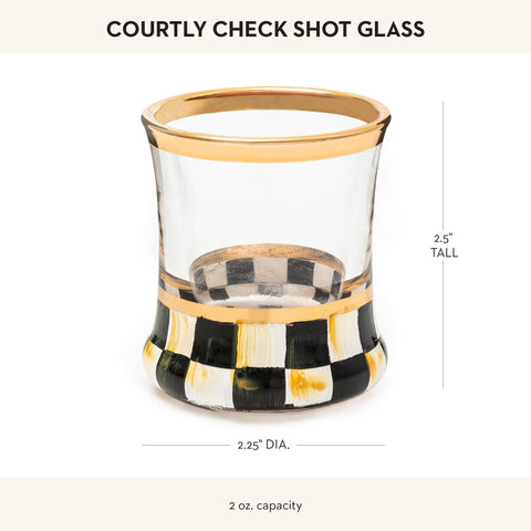 Vaso decorativo MACKENZIE-CHILDS en mesa, perfecto para colección.