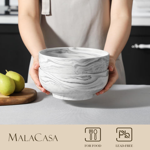 Presentación en mesa MALACASA con ensaladas y pastas atractivas